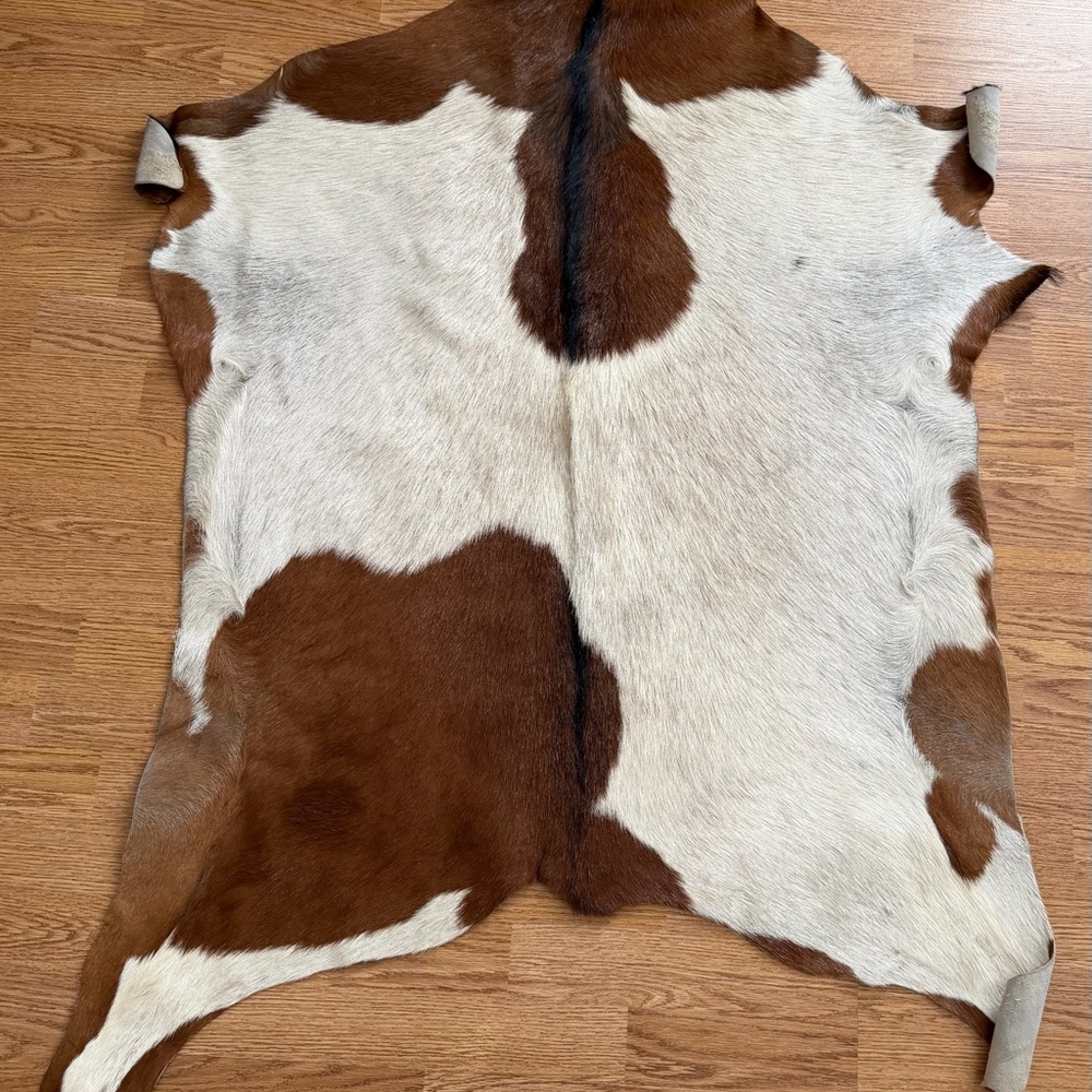 Brown and White Goat Hide Rug